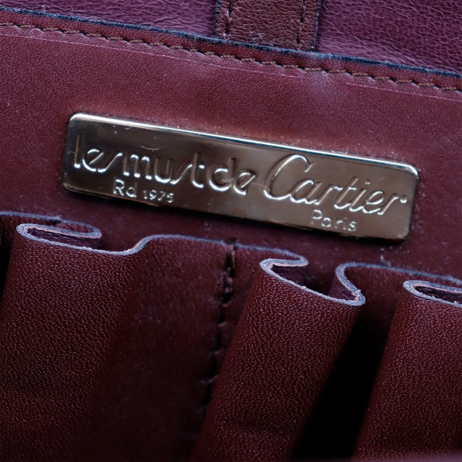 1970s Le Must de Cartier Vintage Bordeaux Leather Shoulder Bag